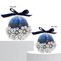 Candela rotonda azzurra con margherite - 2