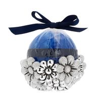 Candela rotonda azzurra con margherite 