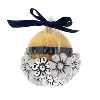 Candela rotonda gialla con margherite 