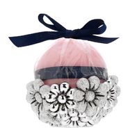 Candela rotonda rosa con margherite 