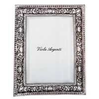 Specchiera in argento lavorata