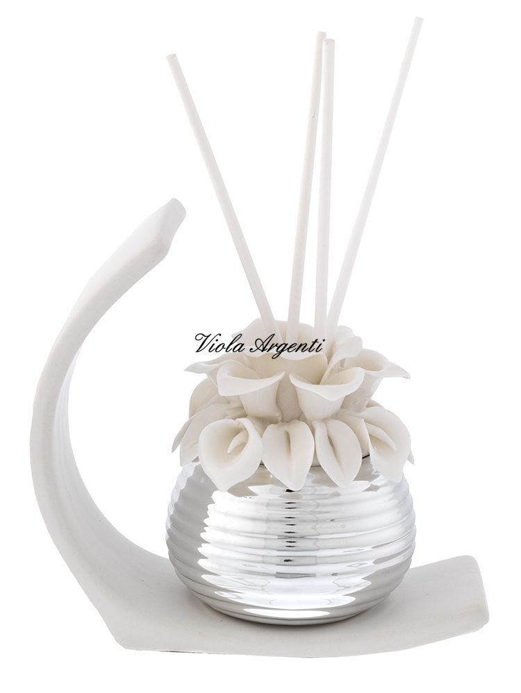Profumatore calla millerighe con base ad arco stilizzato di . Argento online