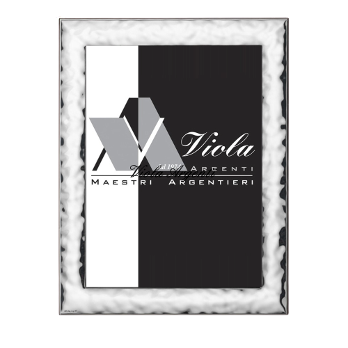 Cornice martellata mossa di . Argento online