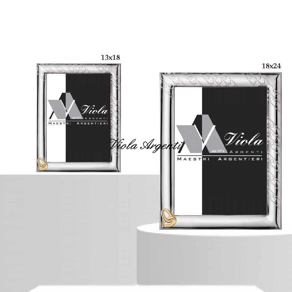 Cornice fedi e cuori di . Argento online