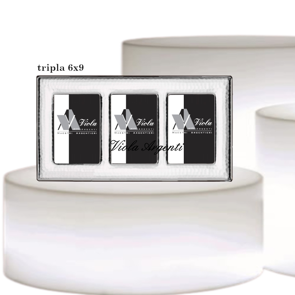 Cornice tripla martellata di . Argento online