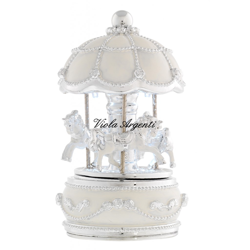 Giostra bianco cavalli con luce di . Argento online