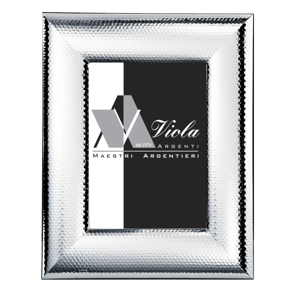 Cornice fascia larga bombata martellata di . Argento online