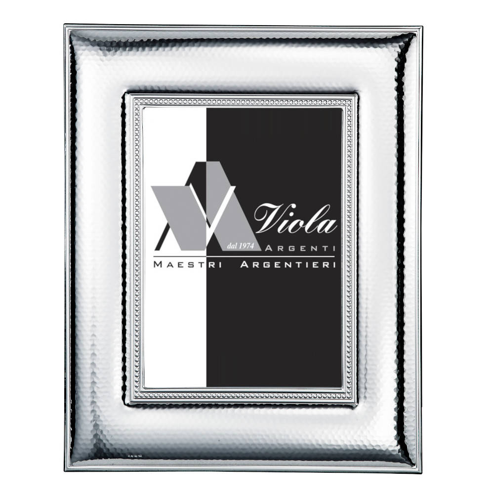 Cornice fascia larga martellata interno pallini di . Argento online
