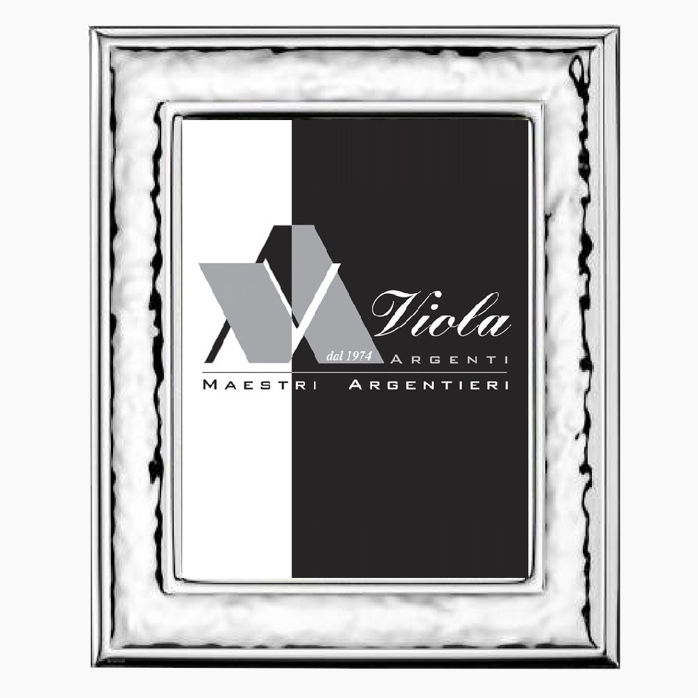 Cornice martellata bordino di . Argento online