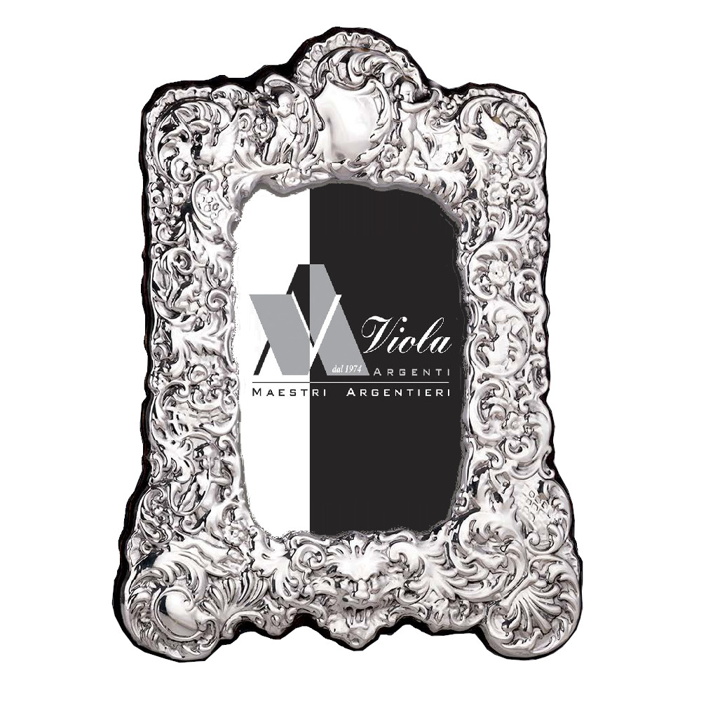 Cornice vittoriana lavorata di . Argento online