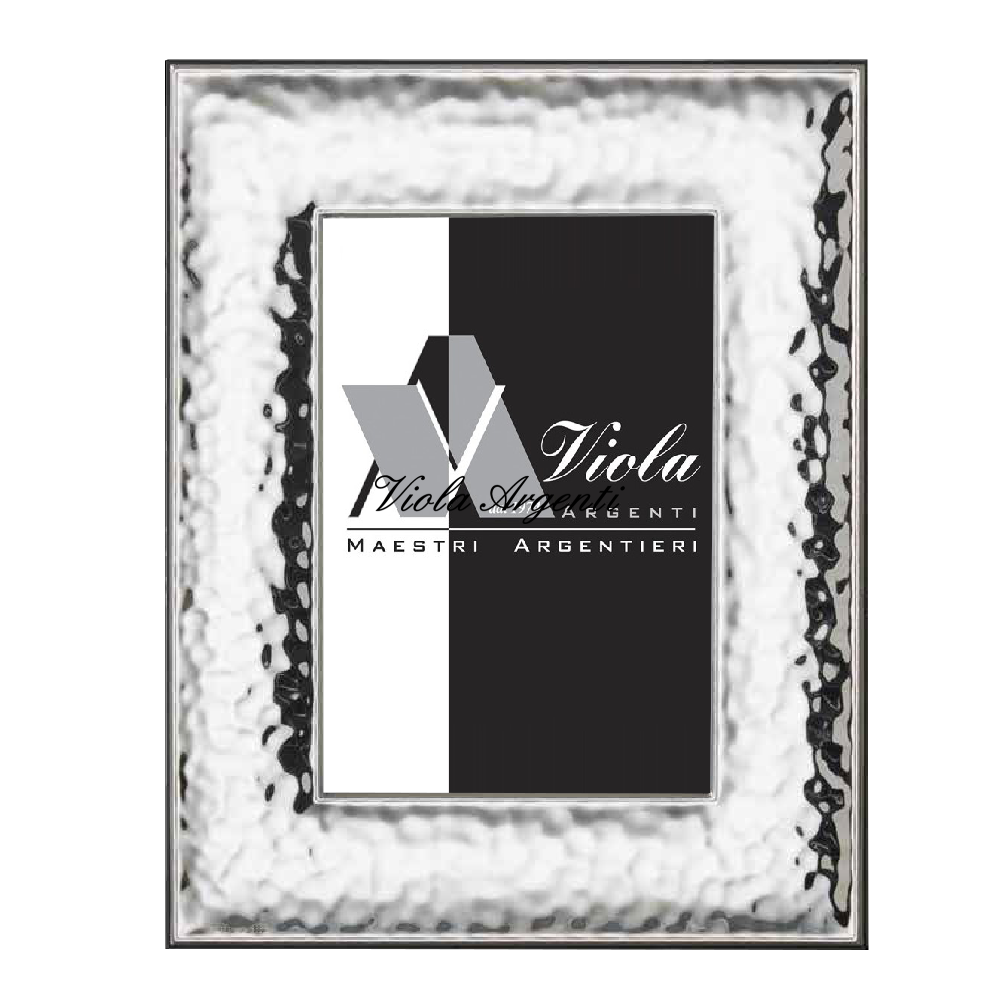Cornice fascia larga martellata di . Argento online