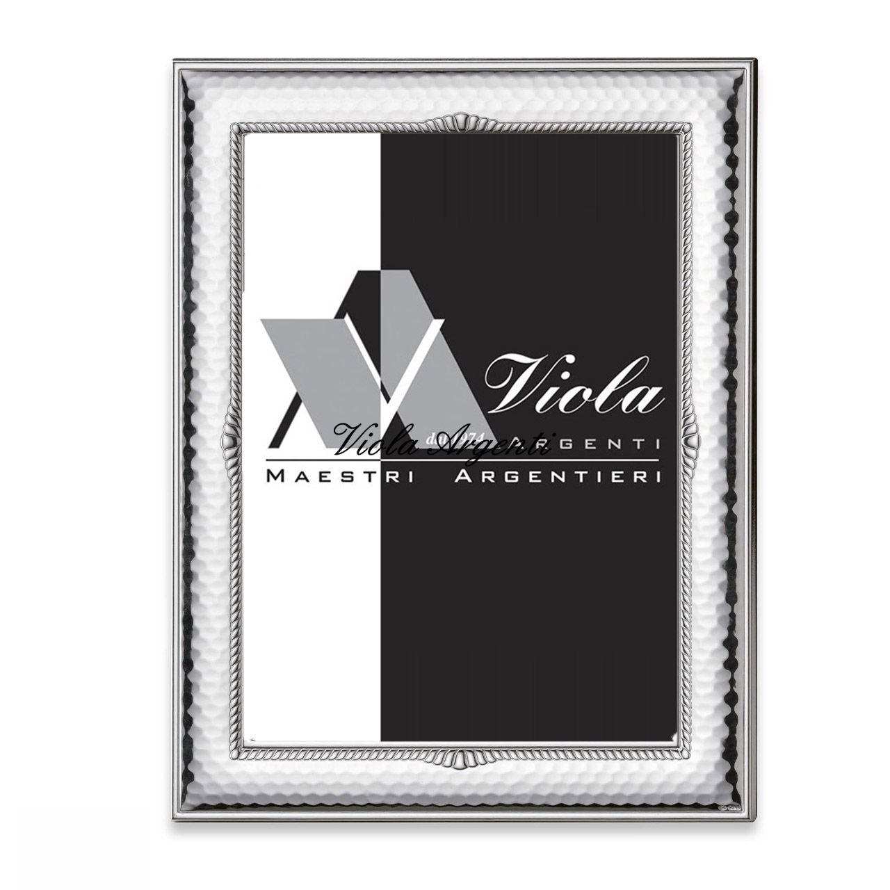 Cornice martellata con decoro  di . Argento online